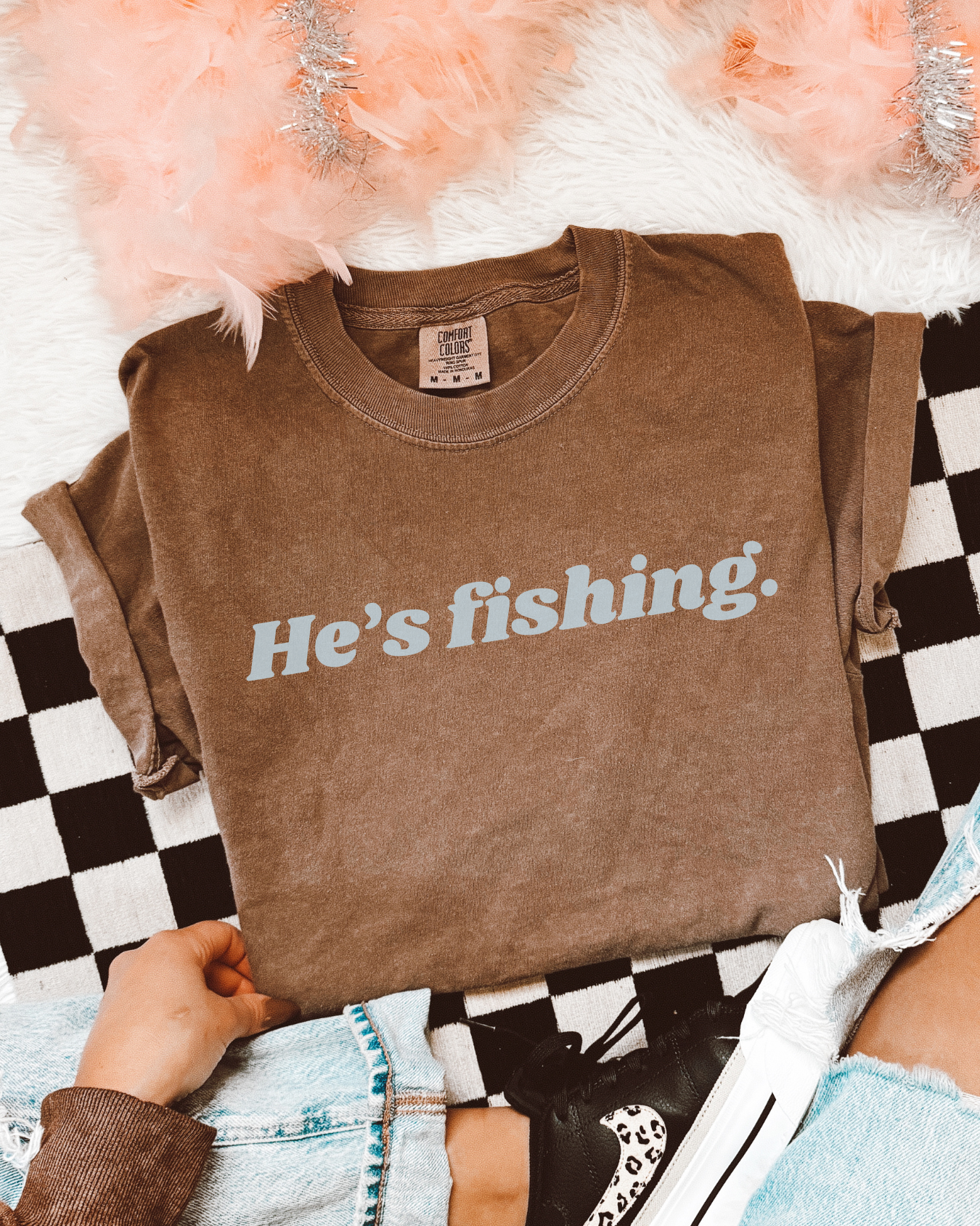 HE'S FISHING.