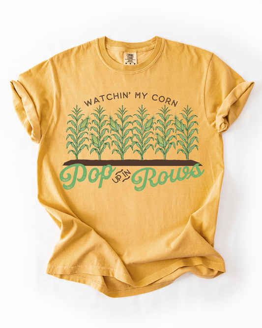 WATCHING MY CORN POP UP IN ROWS